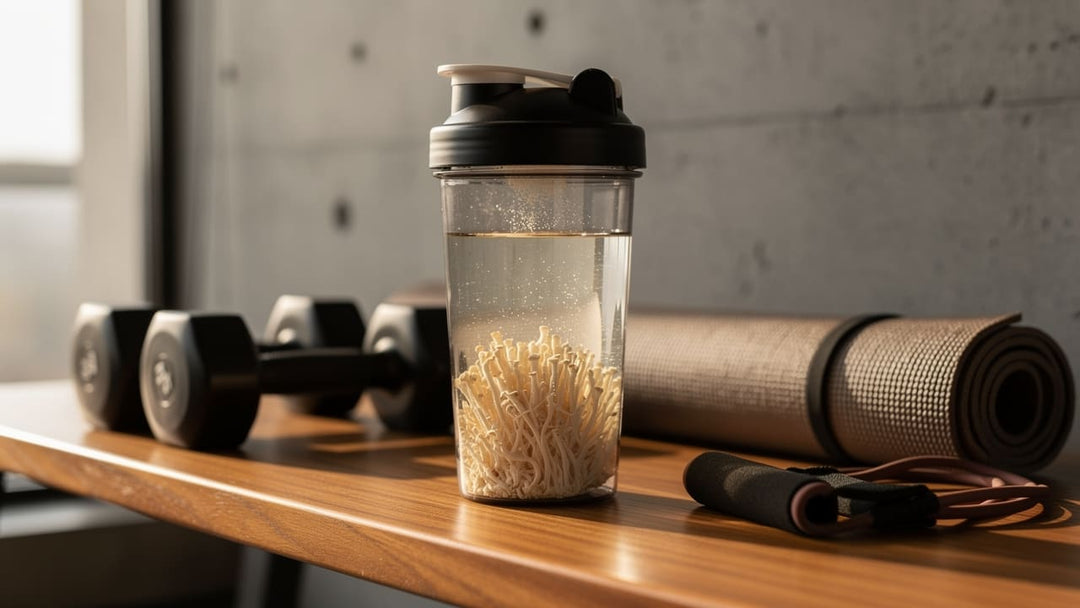 Lion's Mane mushroom powder in a shaker bottle against a terracotta background with running shoes, for Teelixir's athlete performance guide